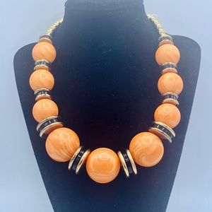 Chunky vintage necklace orange swirl plastic beads new old stock